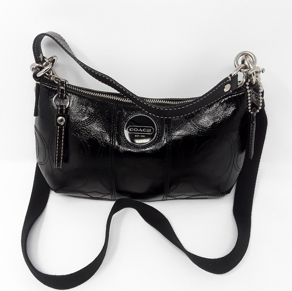 Coach Handbags - Coach black cosmetic Leather crossbody Handbag